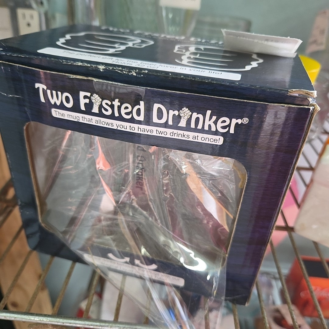 TWO-FISTED drinking cup