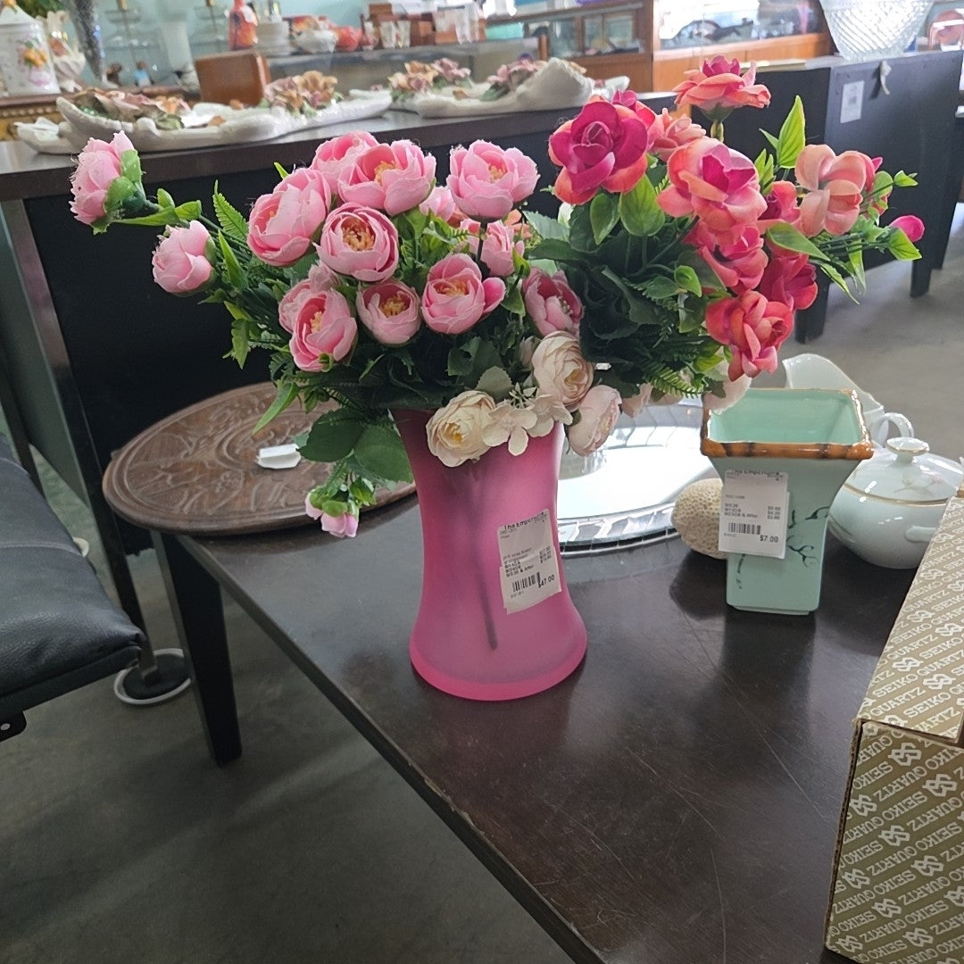 pink vase flower arrangement