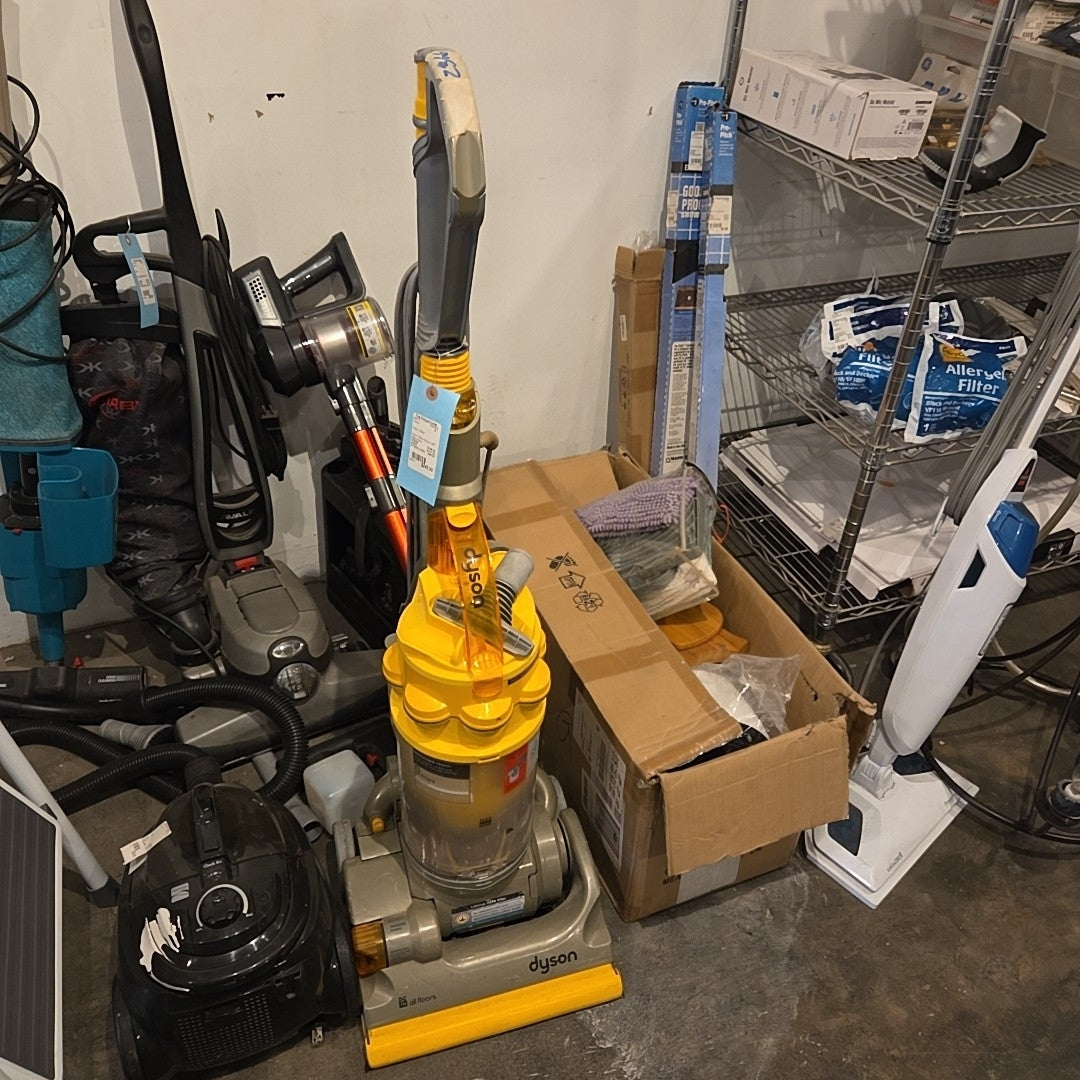 Dyson Yellow Vacuum with attachments