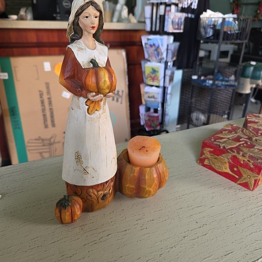 Pilgrim woman candle holder