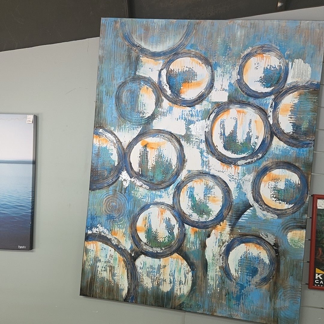 abstract blue/grey/orange painting circles